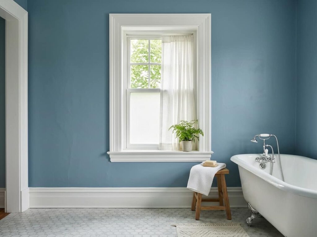 Dusty Blue Walls With Crisp White Trim